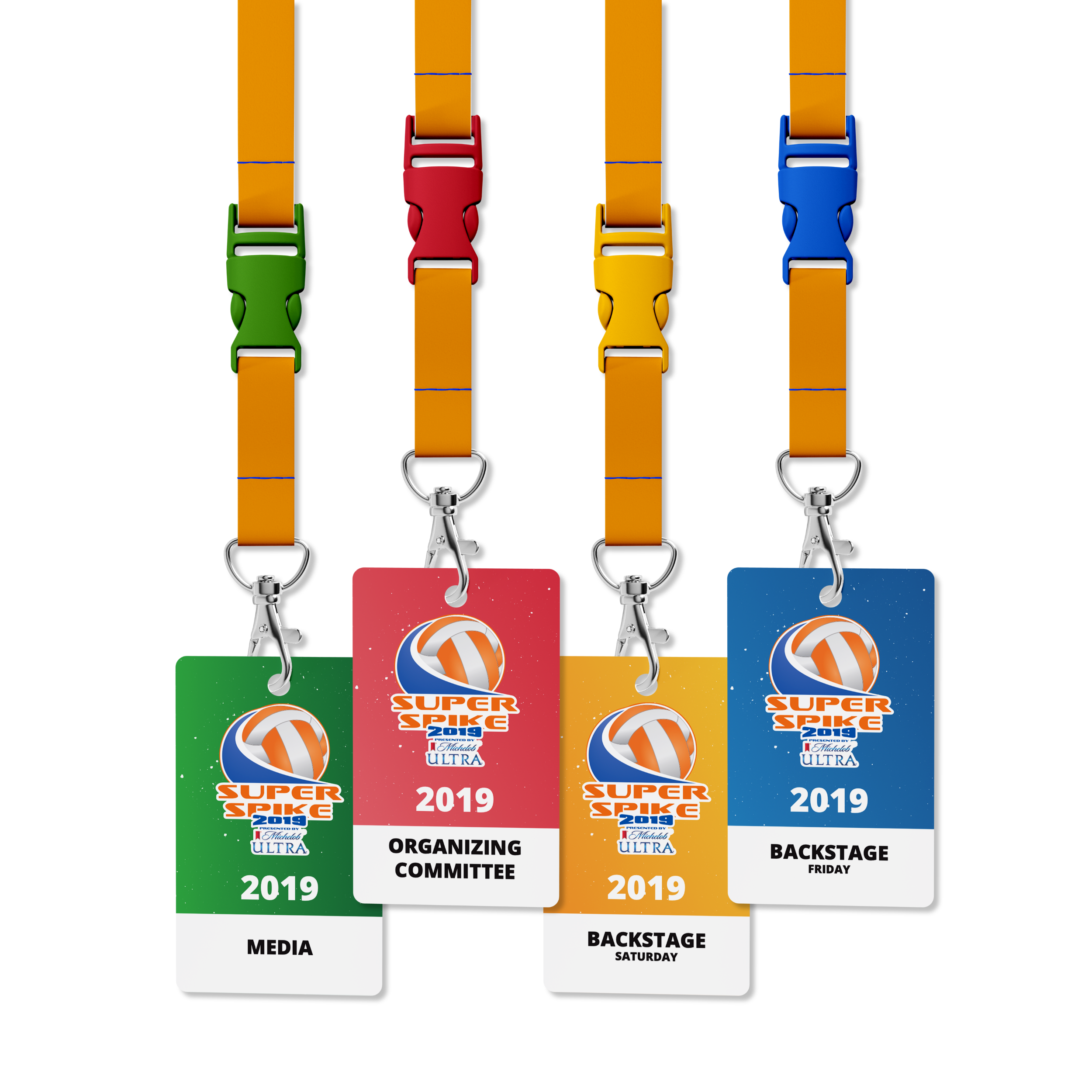 Accreditation badges, colour coded for Media, Backstage, or Committee access.